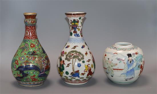 An 18th century Chinese clobbered guglet and two famille rose vases